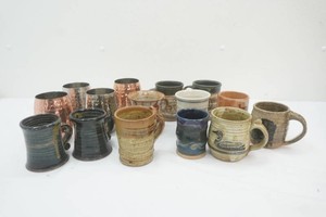 4 aluminum cups and a number of ceramic stoneware cups