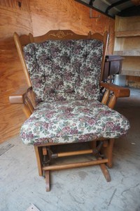 glider rocker with wide wing back design