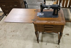 White rotary sewing machine with table, untested