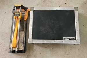 Heavy duty contractor Tile Cutter and an empty Anvil case
