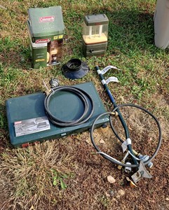 Coleman propane Stove and accessories plus new Coleman Lantern
