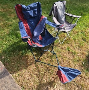 2 camping chairs, one Eddie Bauer, one oversized with footrest and pillow