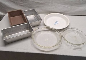 Lot of Baking Dishes and Pans including Pyrex Glass Pie Dish, Corning Ware P-309, and Aluminum Loaf Pans