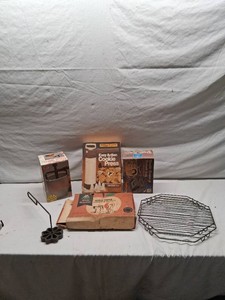 Vintage Kitchenware including White Mountain Apple Peeler, Norpro Donut Maker, and Hutzler Cookie Press with Accessories