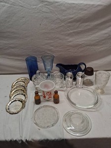 Vintage Glassware and Kitchen Items including Pyrex Mug, Fiesta Pitcher, and Decorative Plates