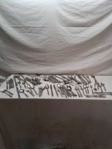 Lot of Assorted Silverware Utensils Including Forks, Knives, and Spoons Various Patterns and Styles
