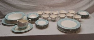 Set of Blue and White Dinnerware with Floral Pattern