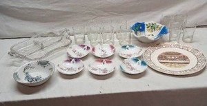 Set of Glassware and Porcelain Dishware including Decorative Plates and Bowls