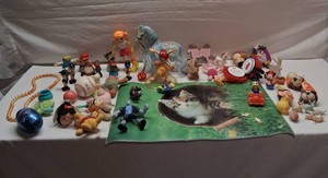 Mixed lot of toys featuring Disney characters and miscellaneous figures, plush toys, and action figures.