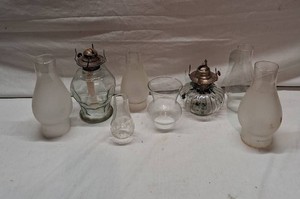 Lot of Mixed Glass and Metal Oil Lamps and Chimneys