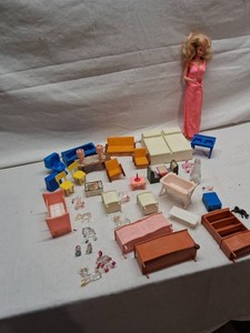 Barbie and Dollhouse Furniture Set Including Doll, Assorted Plastic Furniture, and Accessories