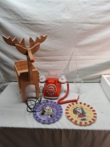 Wooden Reindeer Plant Stand, Coca-Cola Rotary Snow Dome Phone, and Parisevetro Glass Finial with Santa Plates