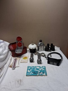 Farm and Outdoor Equipment Lot Including Binoculars, Canteen, Fly Trap, Reflectors, and Flashlights