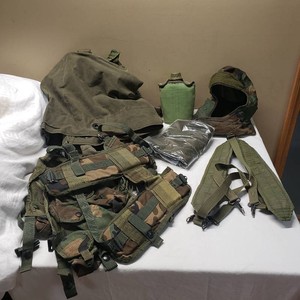 Military Equipment Gear including Canteen, Harness, and Camouflage Accessories