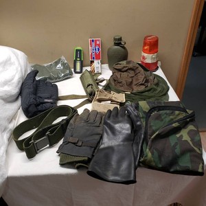Military and Camping Gear Lot including Water Canteen, Gloves, Flashlight, Belt, and Camouflage Items
