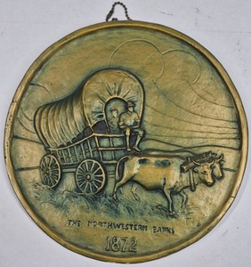 The Northwestern Banks 1872 Covered Wagon Cast Metal Advertising Wall Plaque