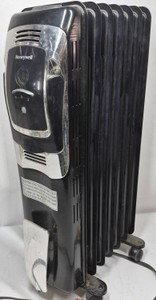 Honeywell Oil-Filled Electric Radiator Space Heater with Digital Controls & Wheels