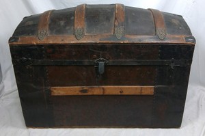 Antique Dome Top Steamer Trunk with Wood Slat Trim and Decorative Metal Hardware
