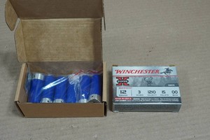 5 Winchester 12 Gauge 3 00 Buck Shotshells, and 6 Dummy Rounds