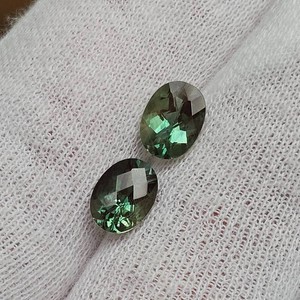 2.24 Carat Total Weight Greenish-Blue Oval Cut Gemstones  Matching Pair