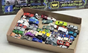 Lot of Hot Wheels Diecast Cars Including Models from 1970 to 1990s, may be other years mixed in as well