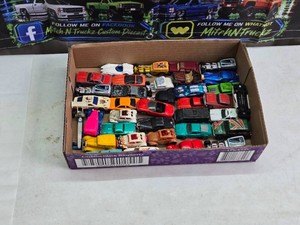 Hot Wheels Die-Cast Cars Lot including 57 Chevy, Jeep CJ-7, and More