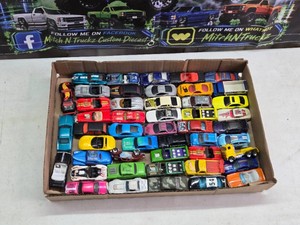 Hot Wheels Diecast Car Lot including 69 Copo Camaro, Ford Fiesta, Jaguar XE SV Project 8, and more