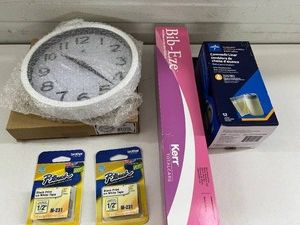 MIXED NEW SUPPLY LOT WALL CLOCK, RAYOVAC BATTERIES, KERR BIB-EZE &amp MEDPRO COMMODE LINERS - CONTENTS AS PICTURED