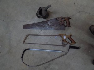 Lot of Misc. 2 saws, Oil Cantarero, Sewer Top