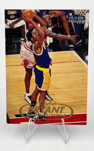 1998-99 Fleer Tradition #1 Kobe Bryant (Dunking on Michael Jordan)