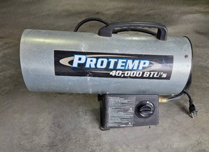 Propane Protemp 40,000 BTUs Heater. Propane tank not included. GREAT FOR YOU GARAGE