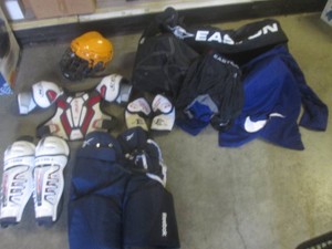 (A-2) Assorted Hockey Gear with Rolling Equipment Bag