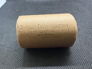 Unopened 20 coin roll of Morgan silver dollars with an 1895 at one end and a CC at the other end