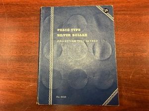 1922 Silver Peace Dollar in a Whitman Peace Dollar Album
