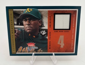 2004 Fleer Baseball Patchworks Numbers Game Miguel Tejada #MT-NG Authentic Game Worn