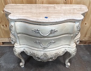 Cream curved nightstand with marble top