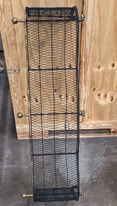 Brass and black wire fireplace fender
