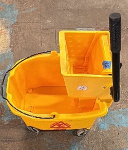 Yellow mop bucket