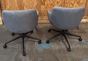 2 gray swivel chairs