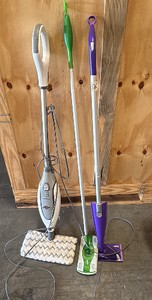 2 swiffer mops and 1 shark mop