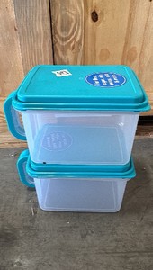 2 blue and clear containers