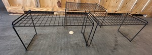 3 black metal racks