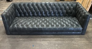 Black leather couch with no legs