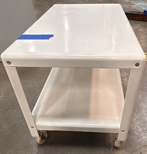 White metal tray in wheels