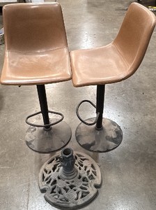 2 bar stools and umbrella base