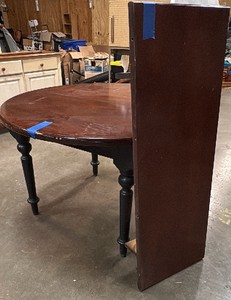 Brown wooden round table