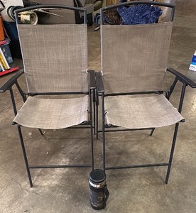2 folding chairs and camo canteen
