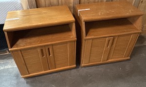 2 small wooden media cabinets
