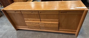 Light-toned wood credenza