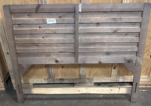 Dark brown wood headboard